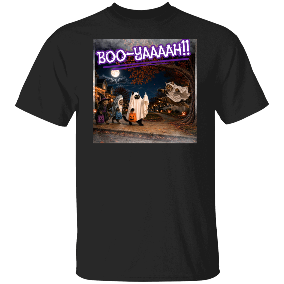 A black short-sleeve t-shirt with a colorful graphic print of a Halloween night scene featuring cat's going trick or treating, and a cat jumping out from behind a tree, dressed as a ghost, to scare the other cats, and the text 'BOO - YAAAAAH!!' in purple neon, worn by a model. The cat that was the intended target is holding up it's middle finger under it's costume as an automatic response to the annoying ghost.