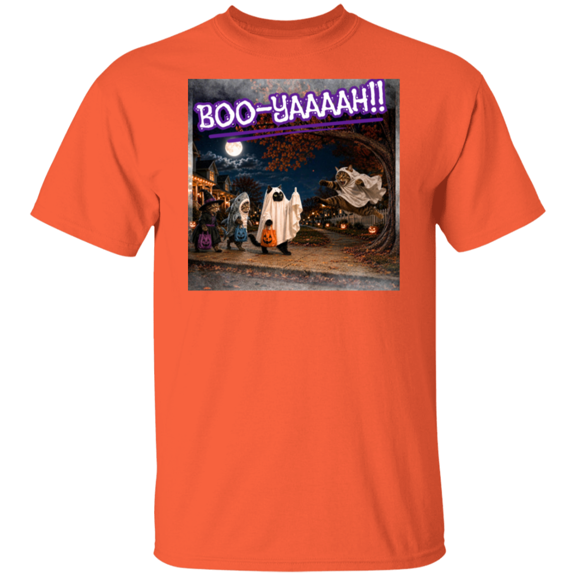 A bright orange short-sleeve t-shirt with a colorful graphic print of a Halloween night scene featuring cat's going trick or treating, and a cat jumping out from behind a tree, dressed as a ghost, to scare the other cats, and the text 'BOO - YAAAAAH!!' in purple neon, worn by a model. The cat that was the intended target is holding up it's middle finger under it's costume as an automatic response to the annoying ghost.