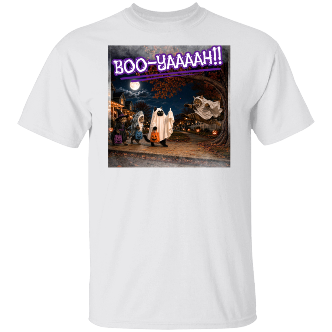 A white short-sleeve t-shirt with a colorful graphic print of a Halloween night scene featuring cat's going trick or treating, and a cat jumping out from behind a tree, dressed as a ghost, to scare the other cats, and the text 'BOO - YAAAAAH!!' in purple neon, worn by a model. The cat that was the intended target is holding up it's middle finger under it's costume as an automatic response to the annoying ghost.