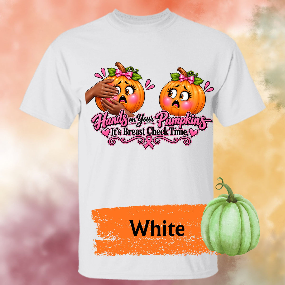 A white graphic t-shirt  with a playful Breast Cancer Awareness Halloween design featuring two adorably horrified pumpkins, pink bows, pink accents, a breast cancer awareness ribbon and the cheeky reminder: “Hands on Your Pumpkins — It's Breast Check Time!” One of the pumpkins is being squeezed.