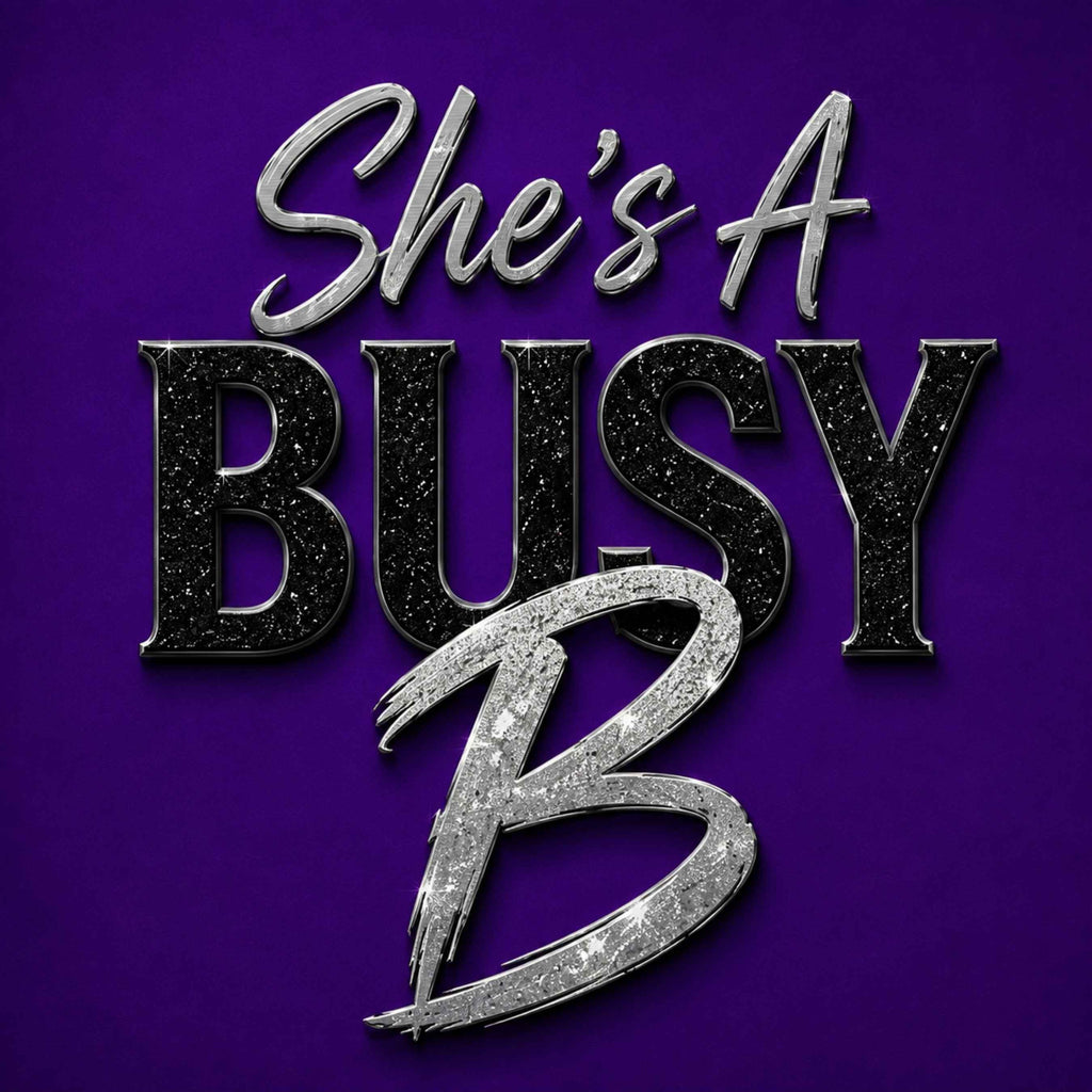The text 'She's A BUSY B' in stylized metallic lettering on a solid purple background.