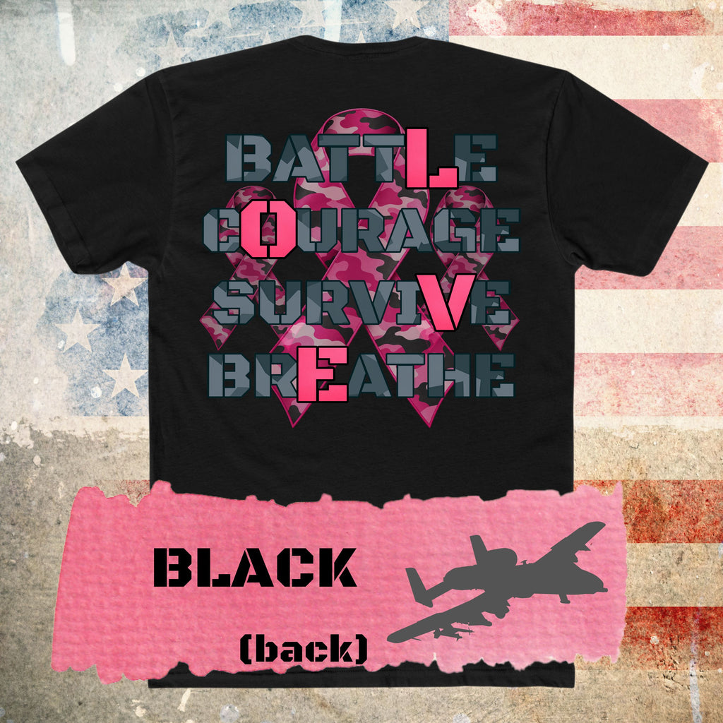 A black t-shirt with a large graphic on the back. The graphic features a pink camouflage ribbon overlaid with the words 'BATTLE COURAGE SURVIVE BREATHE' in a distressed gray font. The "L" from BATTLE is in bright pink, along with the "O" from COURAGE, "V" from SURVIVE, and "E" from BREATHE, showing the word LOVE, set against a military base background at sunset.  