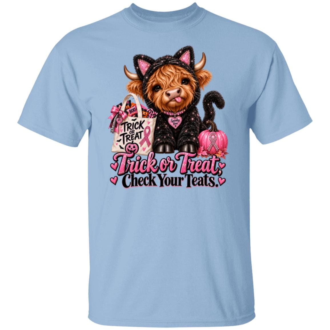 A light blue crewneck t-shirt featuring a graphic of a Scottish highland cow dressed in a black cat costume with pink ears, holding a pink pumpkin and a shopping bag that says 'Trick or Treat'. Below the cow is the text 'Trick or Treat Check Your Teats' in pink and black lettering.