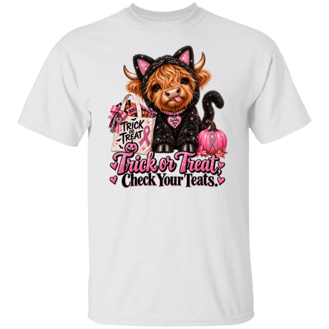 A white short-sleeve crewneck t-shirt featuring a graphic of a Scottish highland cow dressed in a black cat costume with pink ears and a pink heart collar, holding a pink pumpkin and a shopping bag with the text 'Trick or Treat'. Below the cow is the text 'Trick or Treat Check Your Teats' in pink and black.