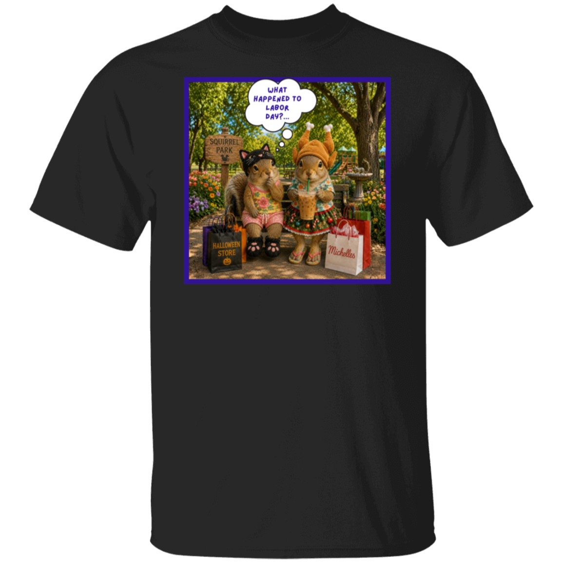 A black short-sleeve crewneck t-shirt featuring a colorful graphic print on the chest. The print shows two fashionable squirrel besties are taking a well-deserved shopping break at Squirrel Park. One is clearly ready for spooky season in her cat costume, while the other has apparently skipped straight past fall and landed somewhere between Thanksgiving and Christmas—iced coffee in hand, naturally. Surrounded by shopping bags and seasonal chaos, one squirrel wonders "What Happened to Labor Day?".