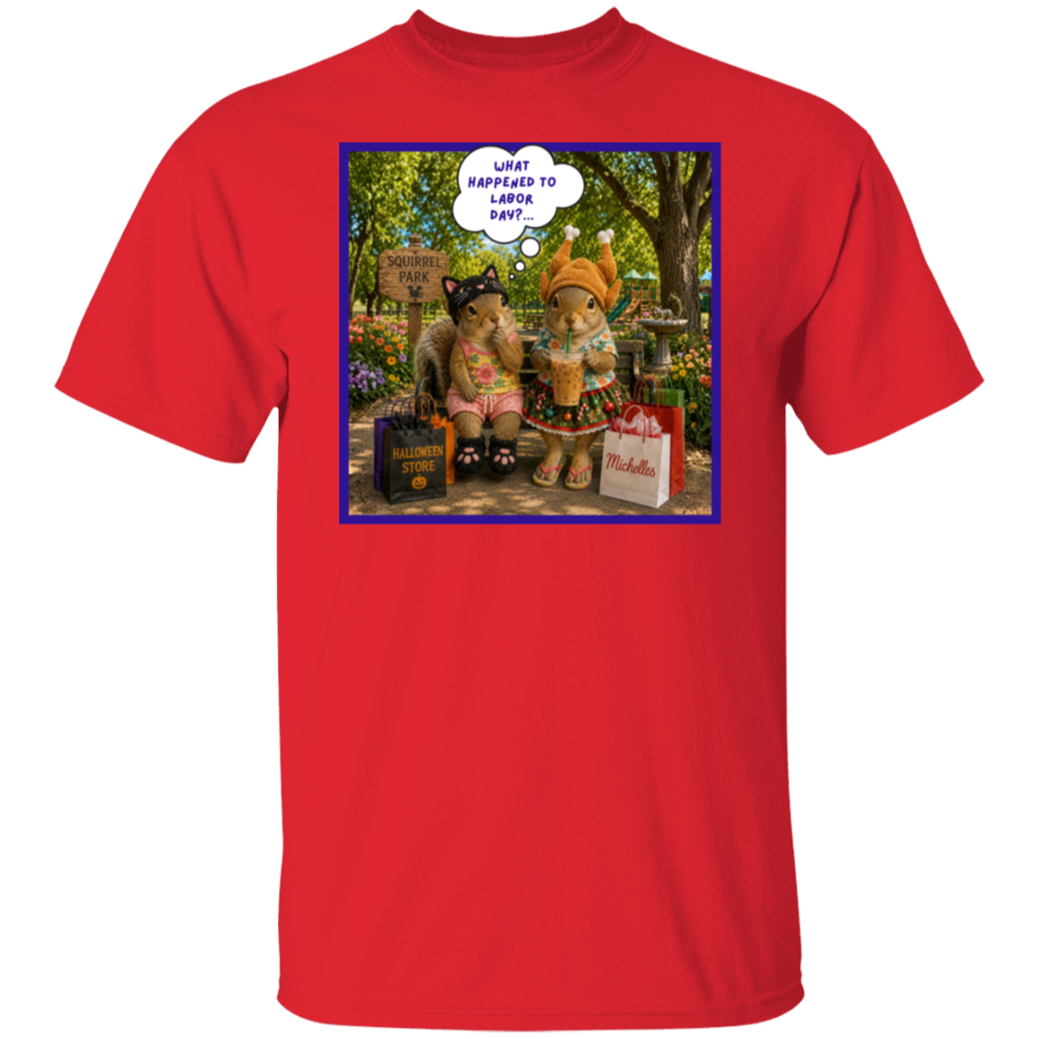 A red short-sleeve crewneck t-shirt featuring a colorful graphic print on the chest. The print shows two fashionable squirrel besties are taking a well-deserved shopping break at Squirrel Park. One is clearly ready for spooky season in her cat costume, while the other has apparently skipped straight past fall and landed somewhere between Thanksgiving and Christmas—iced coffee in hand, naturally. Surrounded by shopping bags and seasonal chaos, one squirrel wonders "What Happened to Labor Day?".