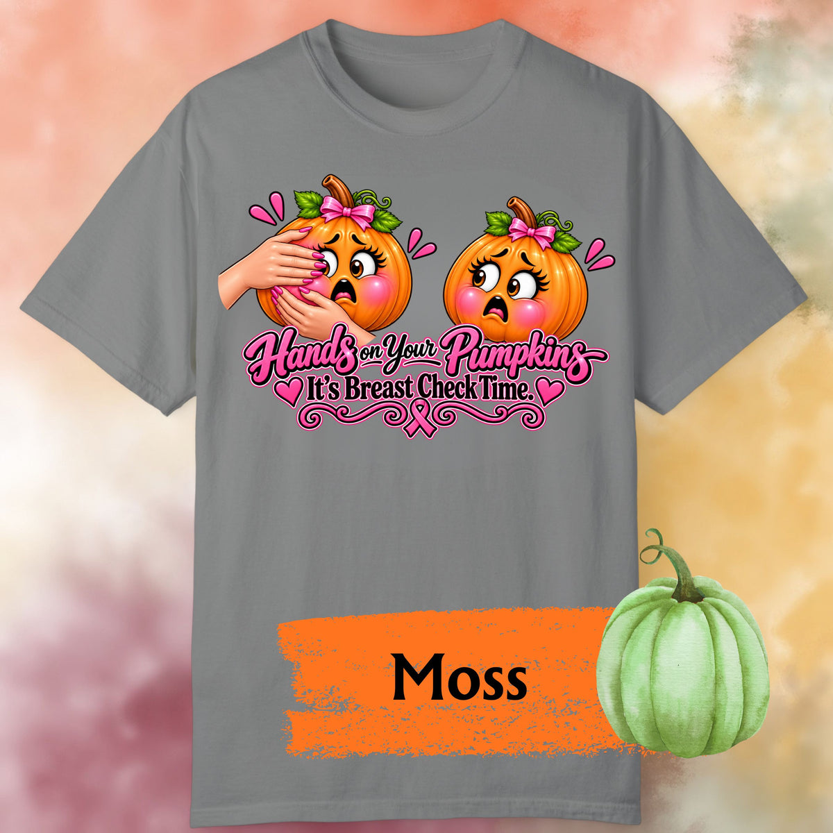 A grey-green short-sleeve graphic t-shirt, featuring a humorous  important reminder with this funny Breast Cancer Awareness Shirt, created for women who like their Pink October message with a little sass. This playful Breast Cancer Awareness Halloween design features two adorably horrified pumpkins, pink bows, pink accents, a breast cancer awareness ribbon and the cheeky reminder: “Hands on Your Pumpkins — It's Breast Check Time!” while what hands are squeezing the one pumpkin for lumpkins.