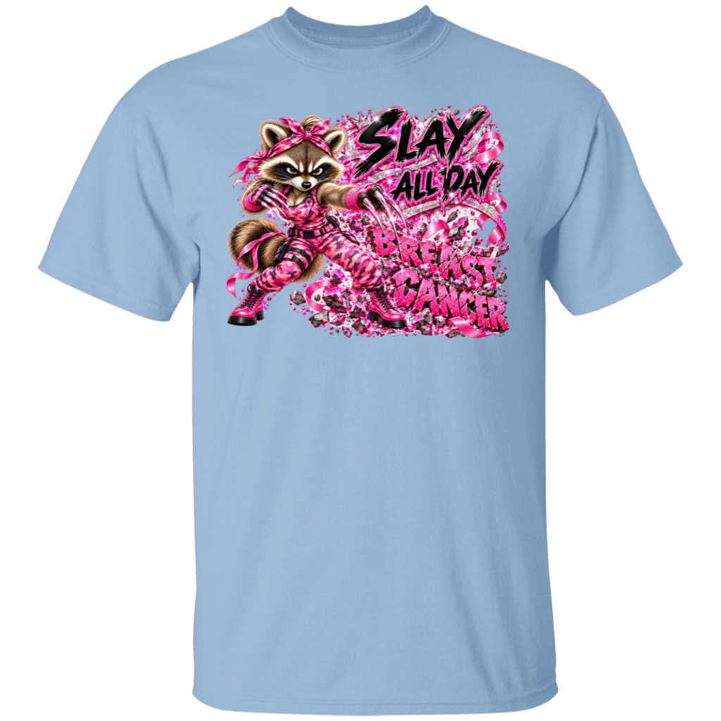 A light blue t-shirt featuring one seriously fierce raccoon dressed from head to toe in sparkling pink camo, breast cancer ribbons and pink combat boots—with her claws out and ready for action. Behind her, the words BREAST CANCER are being smashed to pieces while her message says everything that needs to be said: SLAY ALL DAY.