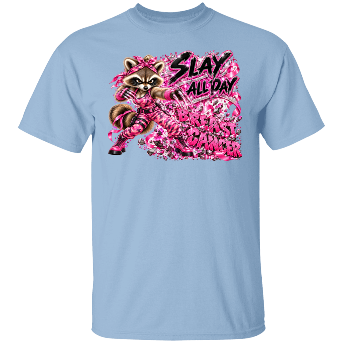A light blue t-shirt featuring one seriously fierce raccoon dressed from head to toe in sparkling pink camo, breast cancer ribbons and pink combat boots—with her claws out and ready for action. Behind her, the words BREAST CANCER are being smashed to pieces while her message says everything that needs to be said: SLAY ALL DAY.